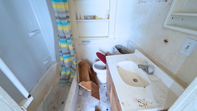 full bathroom featuring vanity and toilet