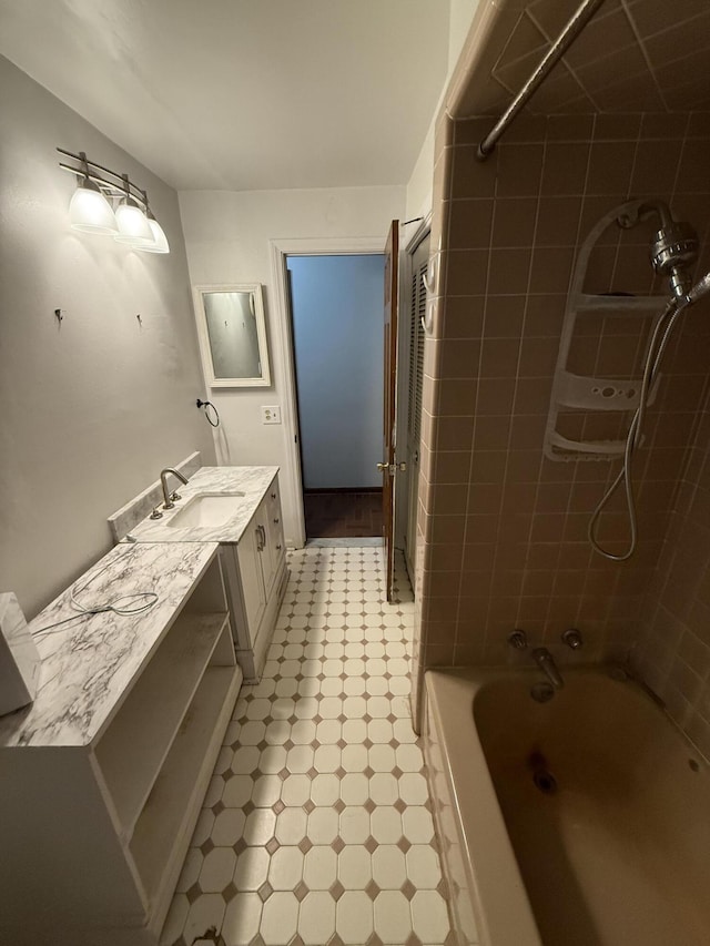 6411 Custer Rd, Carsonville, MI 48419 - full bath featuring vanity, tile patterned floors, and shower / washtub combination