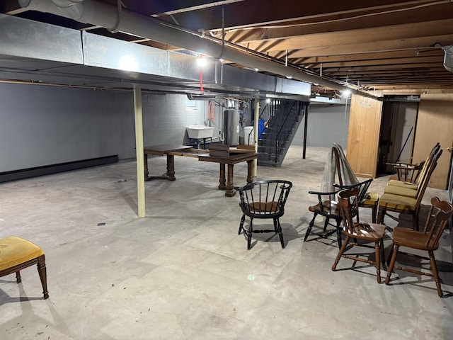 6411 Custer Rd, Carsonville, MI 48419 - unfinished below grade area featuring water heater and a sink