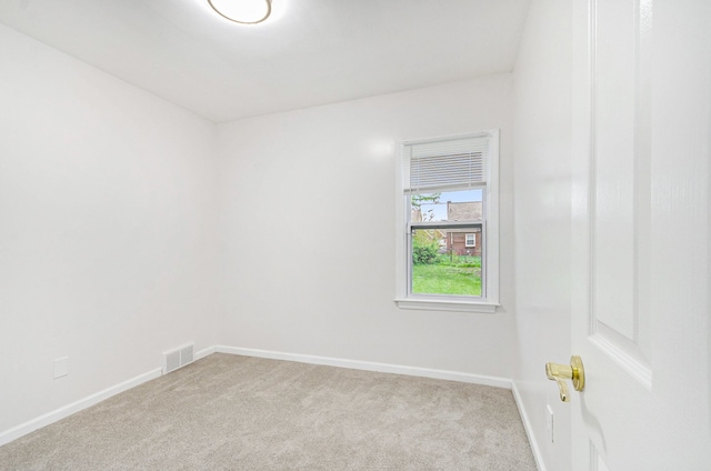 18900 Asbury Park, Detroit, MI 48235 - spare room featuring visible vents, baseboards, and light carpet