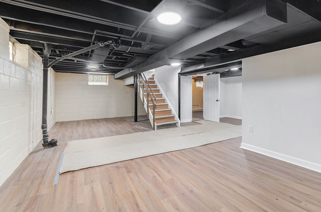 18900 Asbury Park, Detroit, MI 48235 - basement featuring stairway and wood finished floors