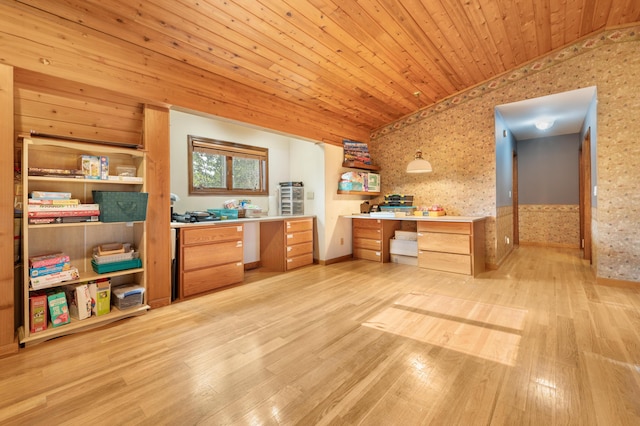 interior space featuring light wood-style floors, wooden ceiling, and wallpapered walls