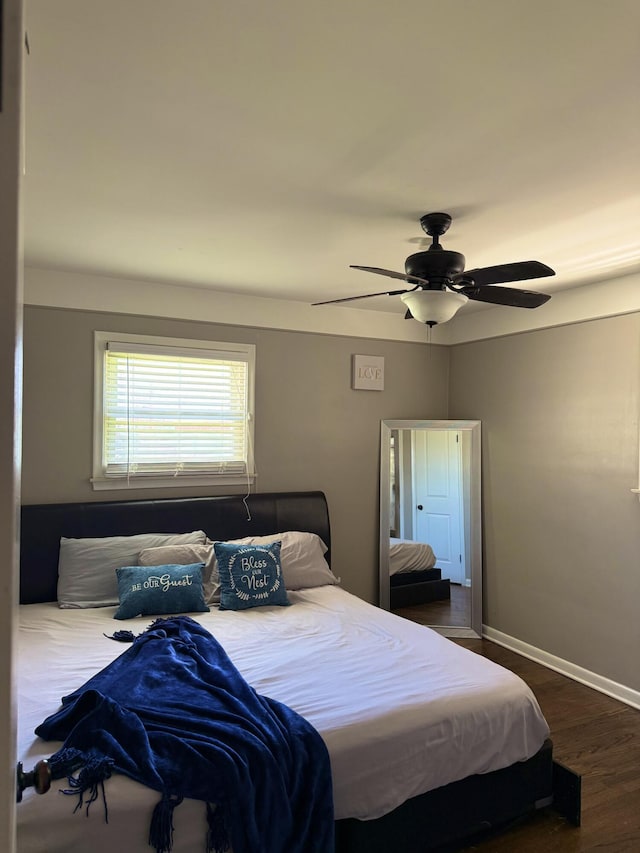 25296 Ronald St, Roseville, MI 48066 - bedroom featuring wood finished floors, ceiling fan, and baseboards