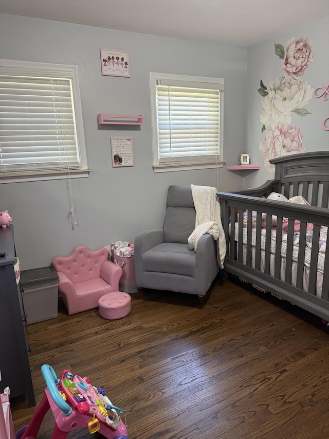 25296 Ronald St, Roseville, MI 48066 - bedroom featuring a nursery area and wood finished floors