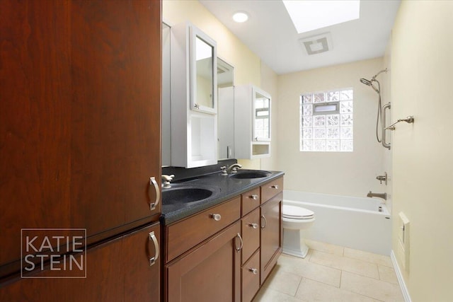 full bathroom with shower / tub combination, a sink, tile patterned flooring, and toilet