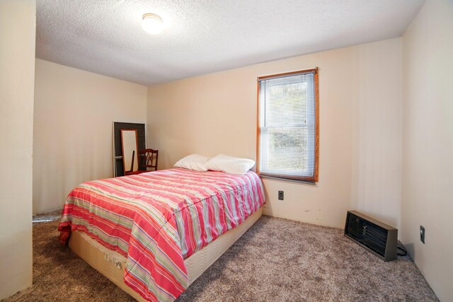 carpeted bedroom with visible vents