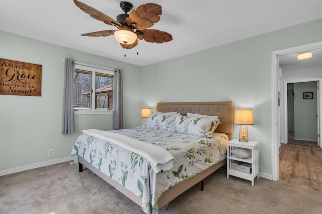1704 Little Dr, Horton, MI 49246 - bedroom with baseboards, ceiling fan, and carpet
