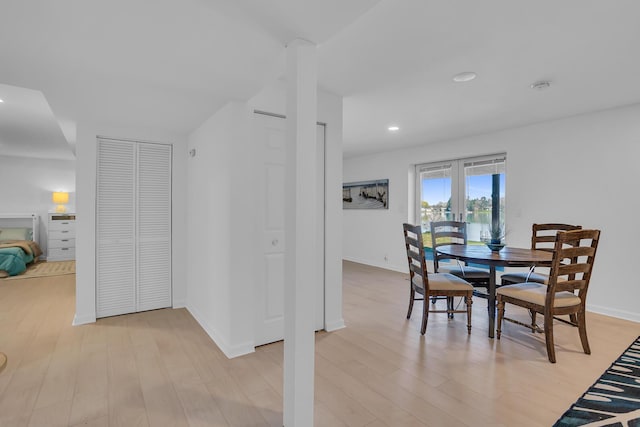 1704 Little Dr, Horton, MI 49246 - dining room with baseboards, french doors, recessed lighting, and light wood-style flooring