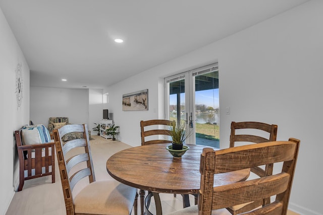 1704 Little Dr, Horton, MI 49246 - dining room with french doors and recessed lighting