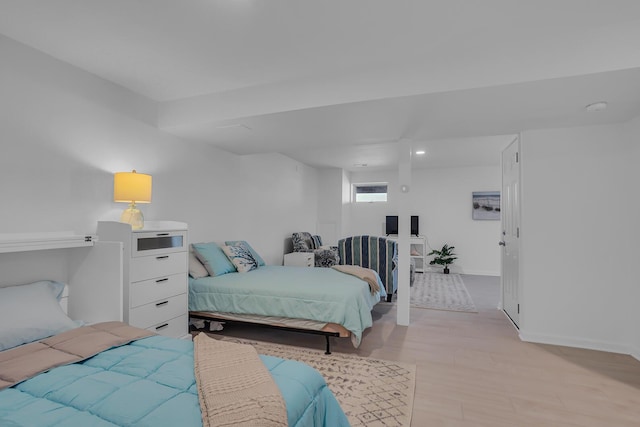 1704 Little Dr, Horton, MI 49246 - bedroom with light wood-style floors, recessed lighting, and baseboards