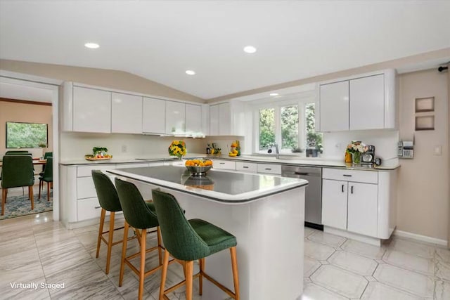 1839 Sudbury Ct, Rochester Hills, MI 48306 - kitchen featuring dishwasher, lofted ceiling, a breakfast bar, healthy amount of natural light, and white cabinetry