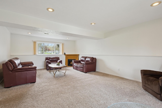 3332 Hampton Downs Dr SE, Kentwood, MI 49512 - carpeted living room featuring recessed lighting, baseboards, and a warm lit fireplace