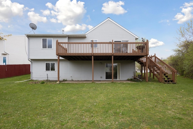 3332 Hampton Downs Dr SE, Kentwood, MI 49512 - back of property with a yard, a deck, fence, and stairs