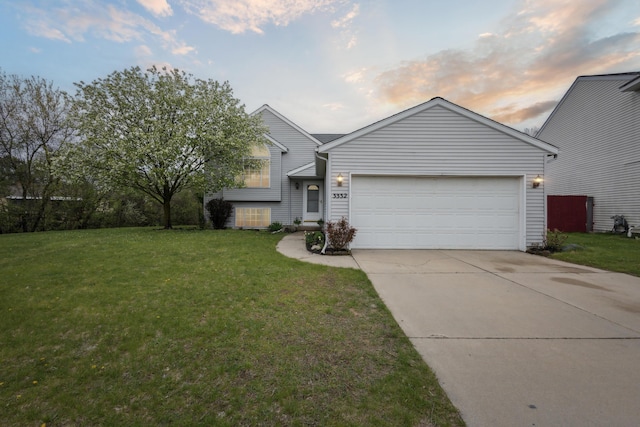 3332 Hampton Downs Dr SE, Kentwood, MI 49512 - split level home featuring an attached garage, driveway, and a front lawn