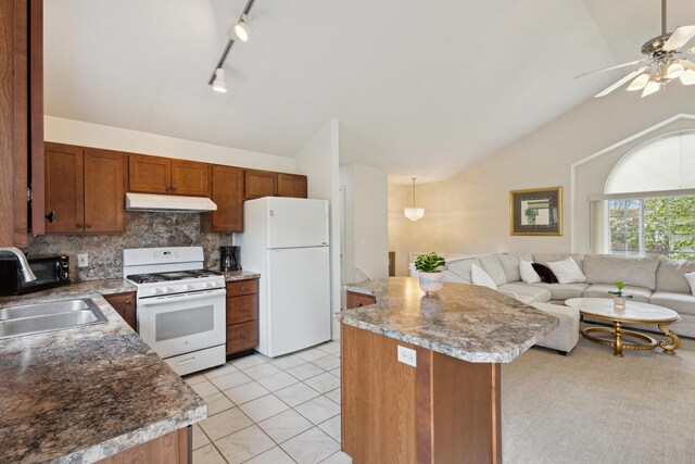 3332 Hampton Downs Dr SE, Kentwood, MI 49512 - kitchen featuring a sink, white appliances, lofted ceiling, under cabinet range hood, and a kitchen island