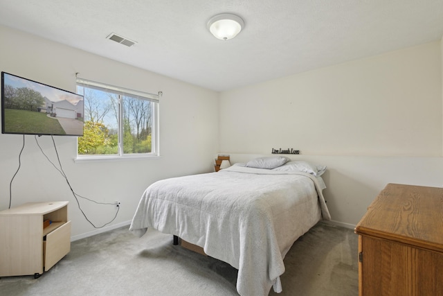 3332 Hampton Downs Dr SE, Kentwood, MI 49512 - bedroom with baseboards, light colored carpet, and visible vents