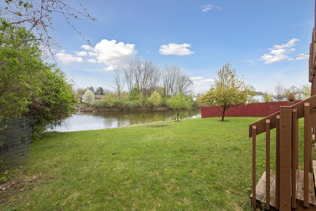 3332 Hampton Downs Dr SE, Kentwood, MI 49512 - view of yard with fence and a water view