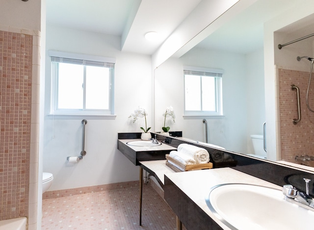 full bath with tile patterned flooring, walk in shower, and toilet