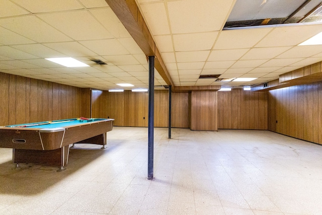 rec room featuring wooden walls, pool table, a drop ceiling, and light floors