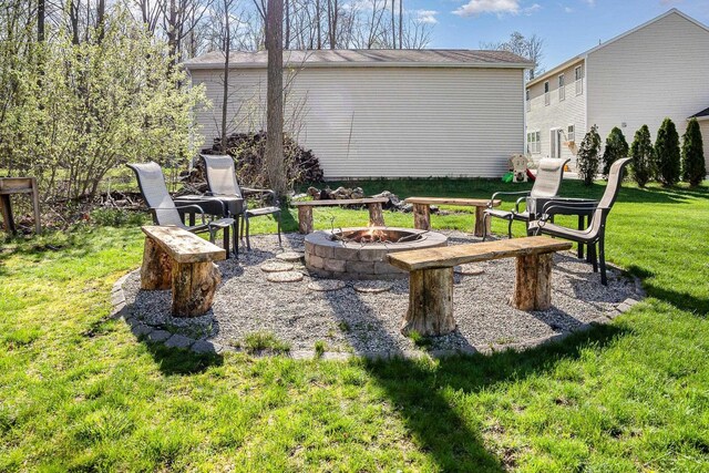 view of yard featuring a fire pit