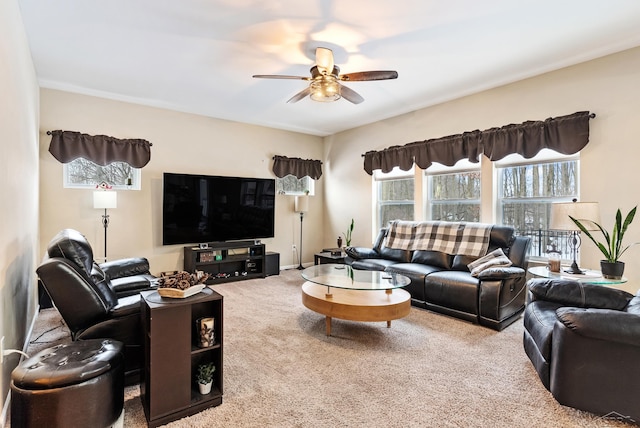 living area with carpet floors and ceiling fan