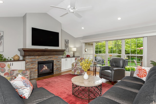 1605 Lloyd Ave, Royal Oak, MI 48073 - living area with wood finished floors, vaulted ceiling, a ceiling fan, recessed lighting, and a fireplace