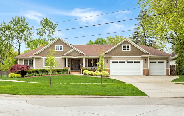 1605 Lloyd Ave, Royal Oak, MI 48073 - craftsman inspired home featuring concrete driveway, an attached garage, a porch, a front lawn, and brick siding