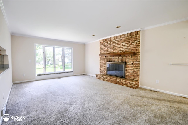 unfurnished living room featuring a fireplace, carpet, baseboards, visible vents, and ornamental molding