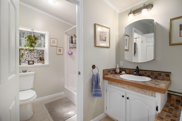 bathroom featuring crown molding, a textured ceiling, toilet, and vanity