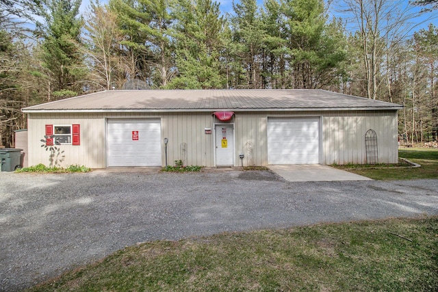 garage featuring driveway