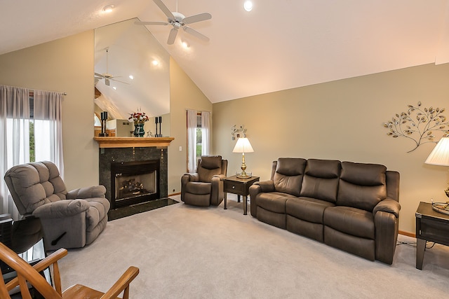 living area featuring ceiling fan, high vaulted ceiling, baseboards, carpet, and a premium fireplace