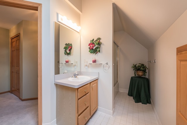 full bath with baseboards, vaulted ceiling, bath / shower combo with glass door, and vanity