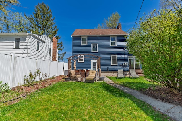 back of property featuring a chimney, fence, a yard, a pergola, and outdoor lounge area