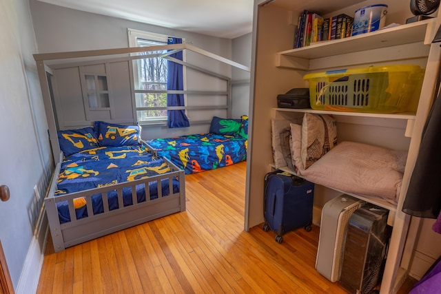 bedroom featuring hardwood / wood-style flooring
