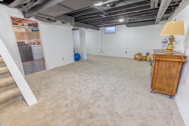 basement with carpet floors and stairway