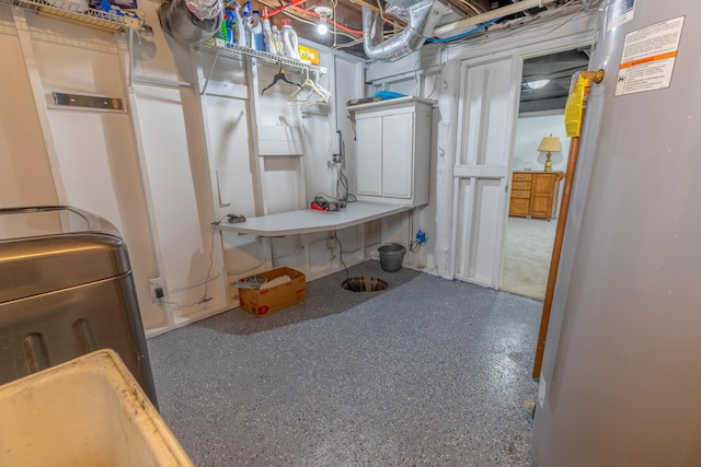 unfinished below grade area featuring fridge