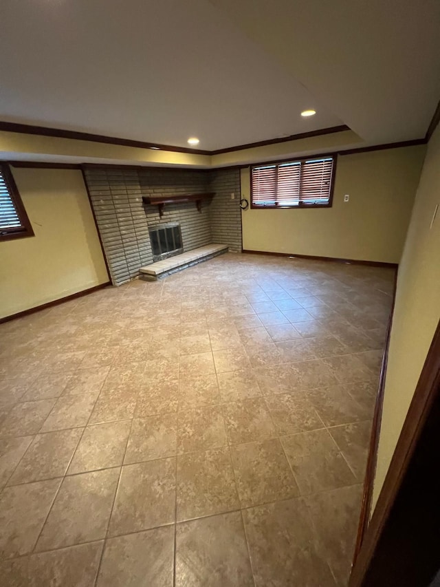 36125 Beverly Dr, Sterling Heights, MI 48310 - unfurnished living room with a brick fireplace, baseboards, ornamental molding, and light tile patterned floors