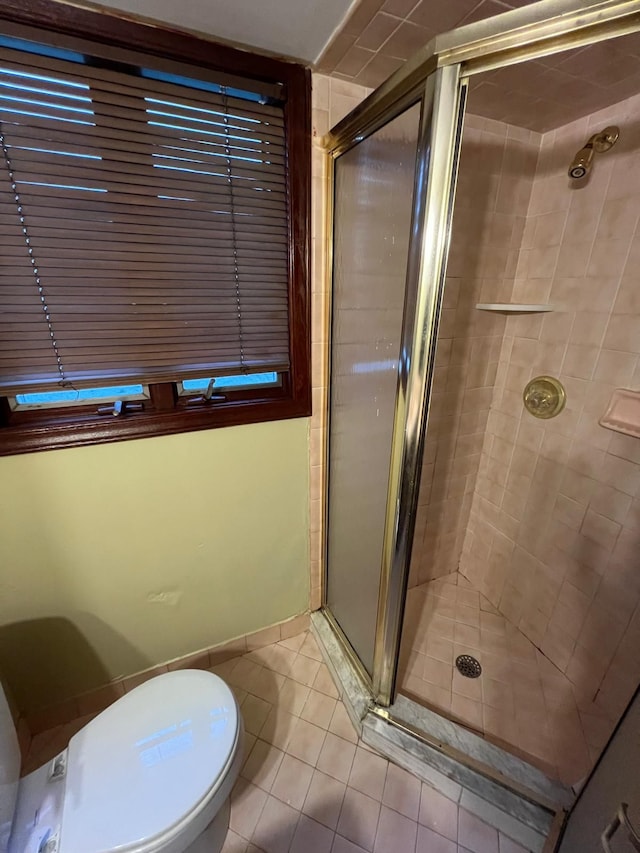 36125 Beverly Dr, Sterling Heights, MI 48310 - full bath featuring tile patterned flooring, a shower stall, and toilet