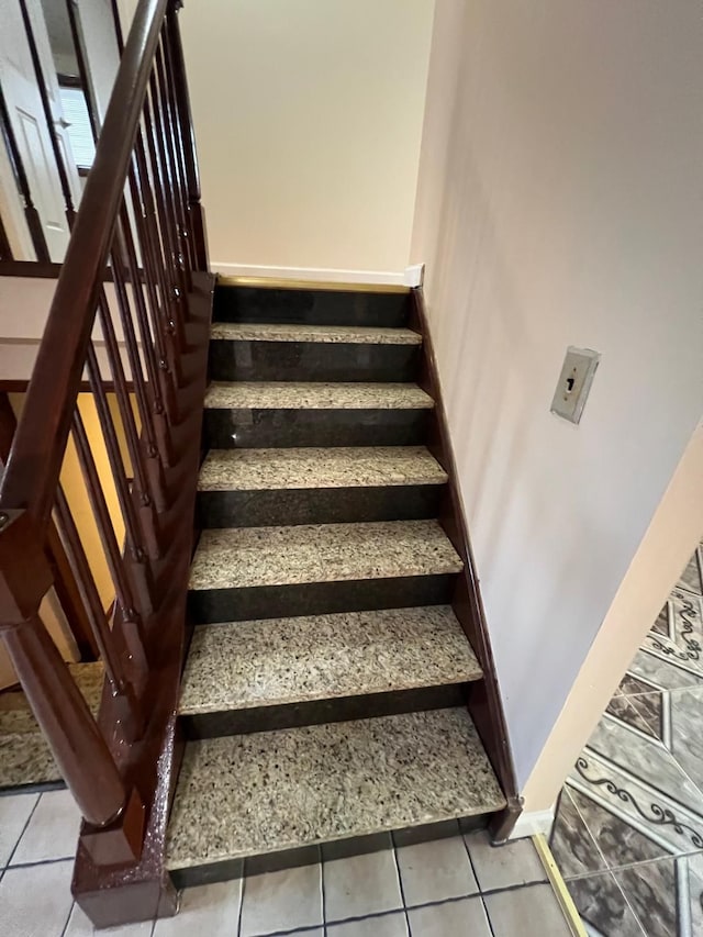 36125 Beverly Dr, Sterling Heights, MI 48310 - stairs with tile patterned floors and baseboards