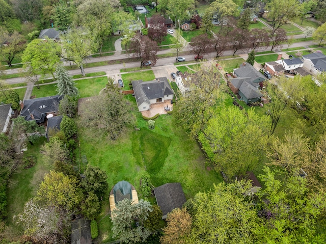 birds eye view of property with a residential view