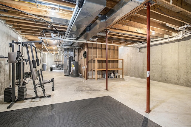 unfinished basement with heating unit and water heater