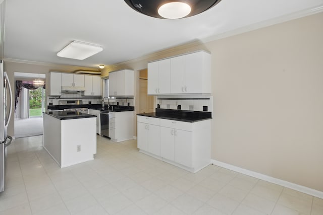 3351 Muerknoll Dr, Troy, MI 48084 - kitchen featuring stainless steel appliances, dark countertops, ornamental molding, and tasteful backsplash