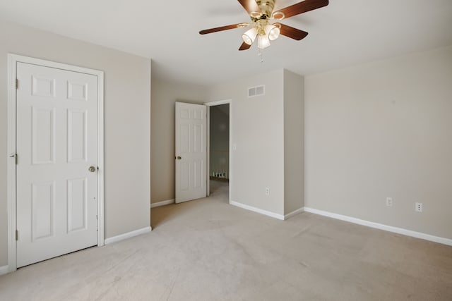 3351 Muerknoll Dr, Troy, MI 48084 - unfurnished bedroom featuring baseboards, a ceiling fan, light colored carpet, and visible vents
