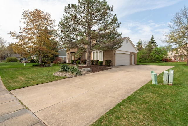 3351 Muerknoll Dr, Troy, MI 48084 - obstructed view of property with a garage, a front yard, and concrete driveway