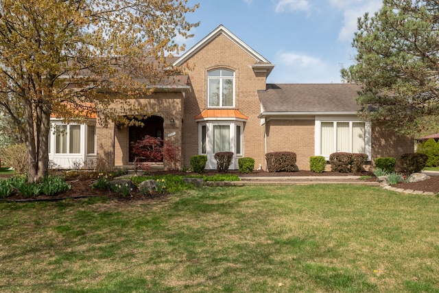 3351 Muerknoll Dr, Troy, MI 48084 - traditional-style house with brick siding, a shingled roof, and a front yard