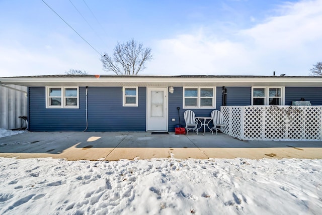 view of snow covered property
