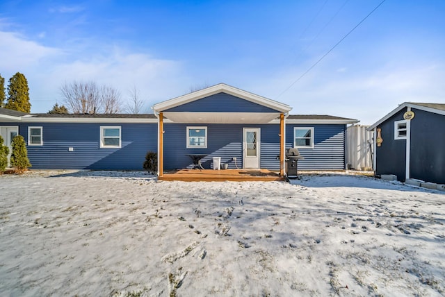 view of snow covered house