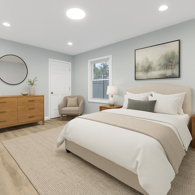 bedroom with recessed lighting and light wood finished floors