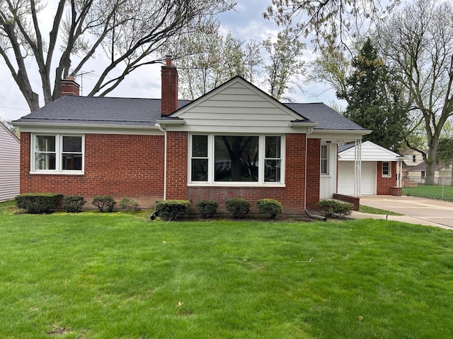 ranch-style house featuring brick siding, driveway, a chimney, and a front yard