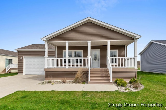 view of front facade featuring a garage, a front lawn, covered porch, and concrete driveway